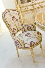 ivory lacquered armchair